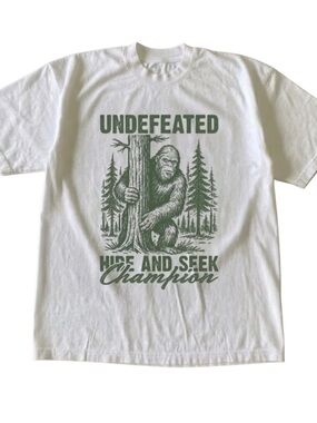 Gildan White Tee with Green 'Undefeated Hide and Seek Champion' Graphic